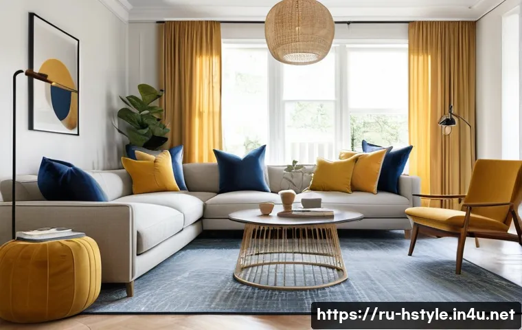 홈스타일링과 미적 감각 키우는 법 - A stylish modern living room interior featuring a warm neutral color palette with beige and soft gra...